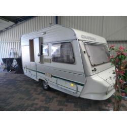 Chateau La Car caravan vastbed en zit