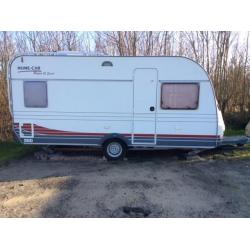 Home-Car 450 spirit rondzit en vast bed en airco