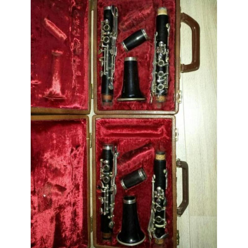 2x houten Duits Bes klarinet 100%in orde.lederen koffer