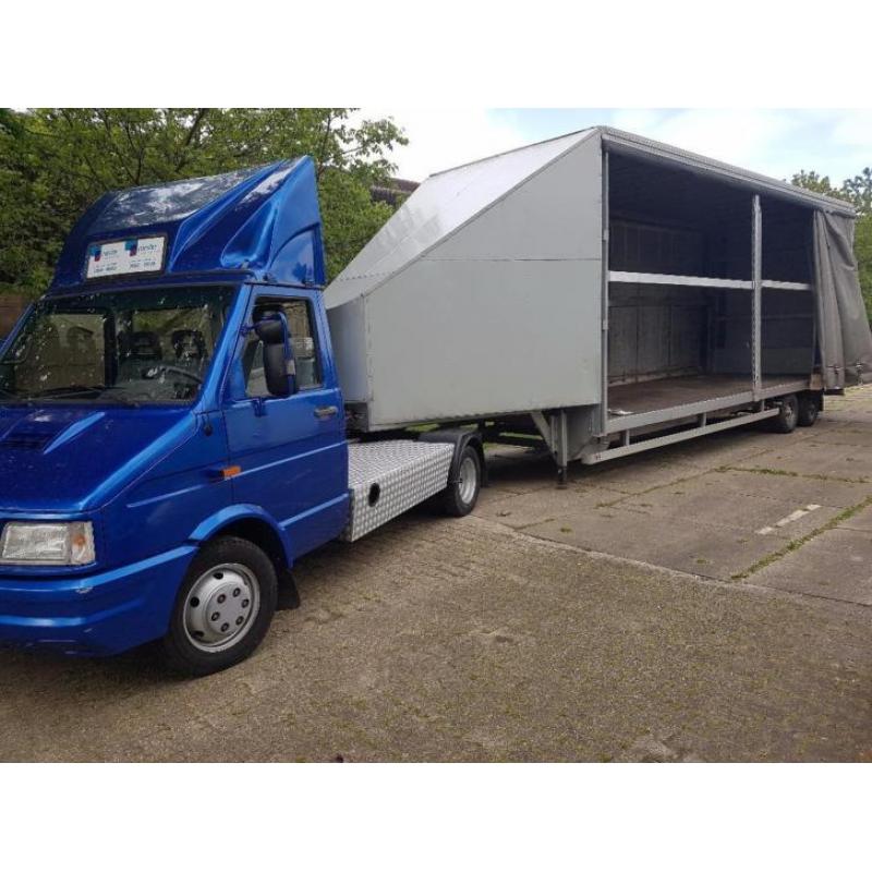 Iveco be combinatie met trailer/oplegger met schuifzijlen