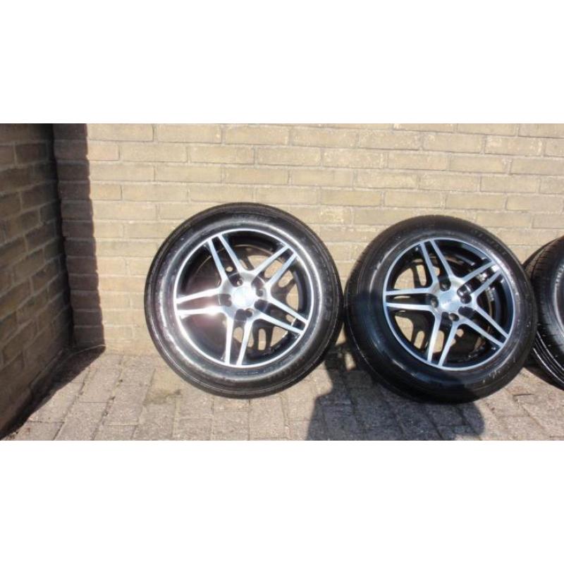 Dezent Dark 15inch met Dunlop Sport