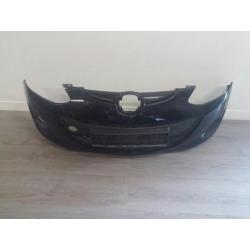 Mazda 2 voorbumper zwart nr550