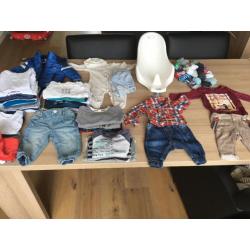 Grote zak met babykleding inclusief badzitje